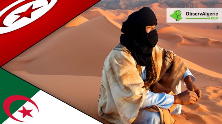 Un nomade touareg assis sur le sable du Sahara, avec les drapeaux de l'Algérie et de la Tunisie