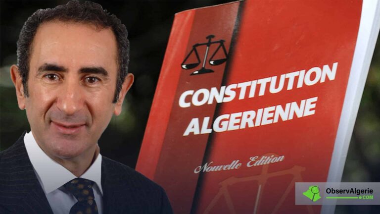 Fatsah Ouguergouz avec la Constitution algérienne en arrière plan